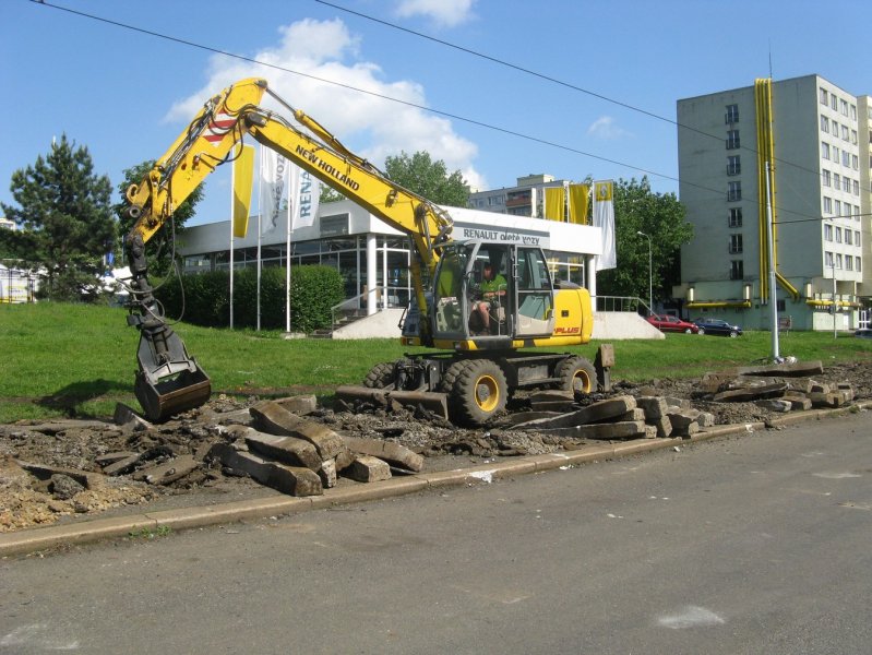 Kolové rýpadlo New Holland MH Plus s drapákem